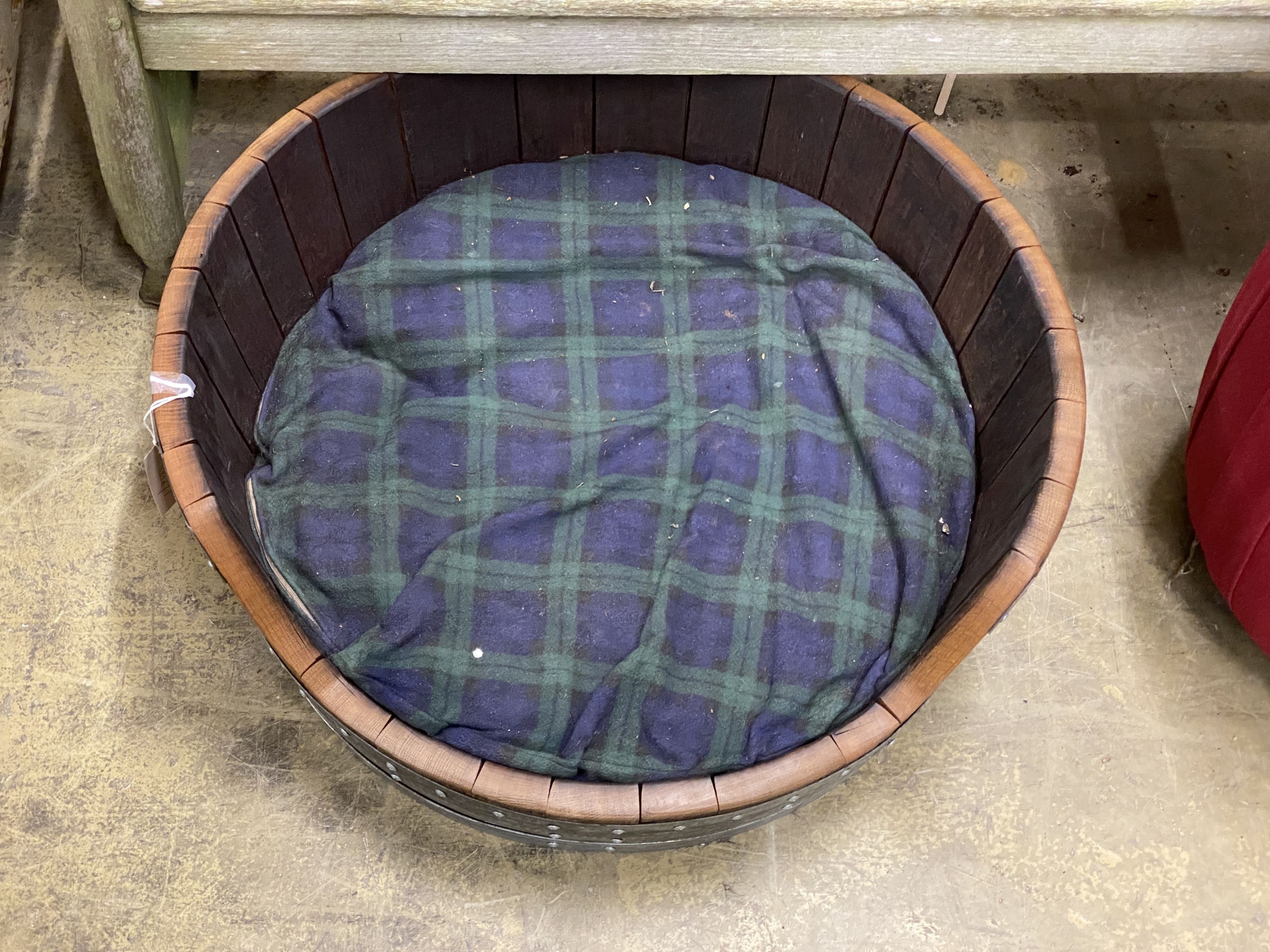 A metal bound oval staved oak dog's bed, width 70cm, depth 68cm, height 29cm